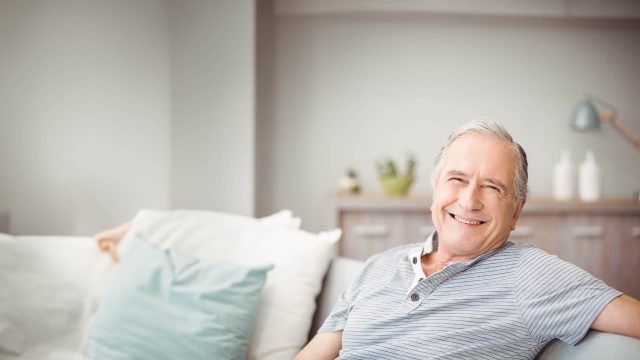 a man sitting in the couch